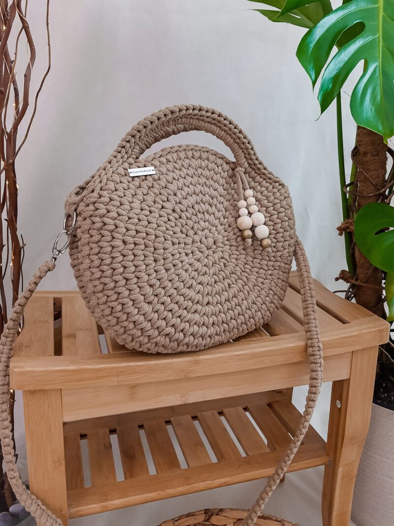 okrągła torebka ze sznurka do ręki i przez ramię, beżowa, złota, stare złoto